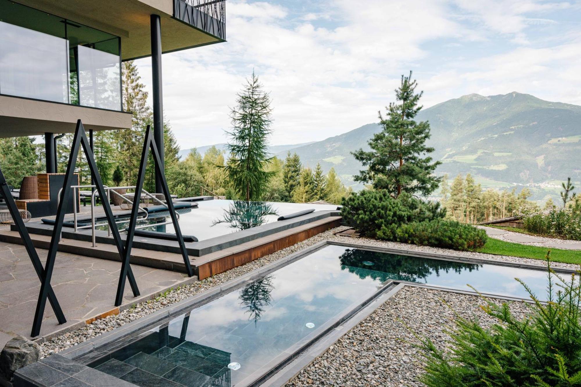 Hotel My Arbor - Dolomites Bresanona Exterior foto A private swimming pool in the Alps